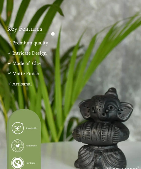 Melodic Mastery: Black Terracotta Ganesh and Tabla Ensemble — image 5