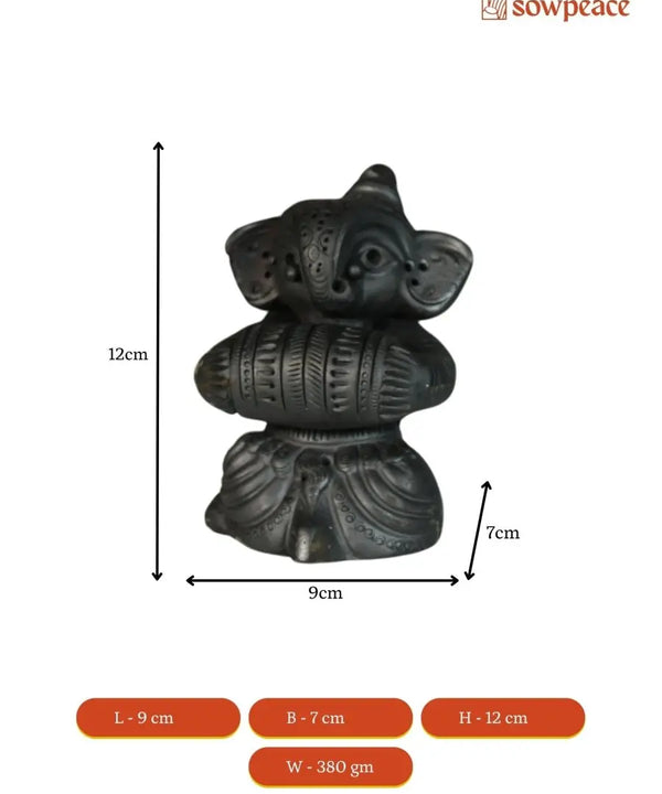 Melodic Mastery: Black Terracotta Ganesh and Tabla Ensemble — image 6