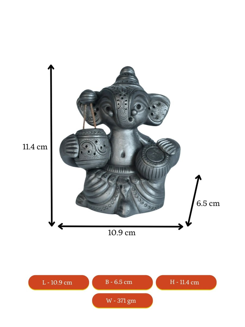 Serene Rhythms: Black Terracotta Ganesh Playing Iktara and Tabla – view 7