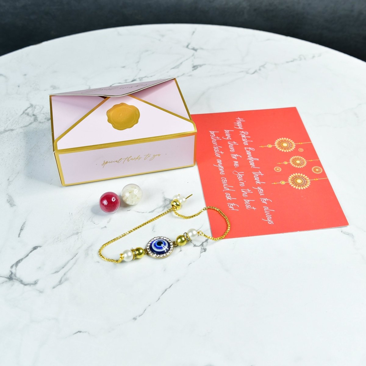Sowpeace Exquisite Evil Eye Rakhi Pack of 2 with Roli Chawal and Greeting card combo for Raksha Bandhan and Gifting - Sowpeace - 